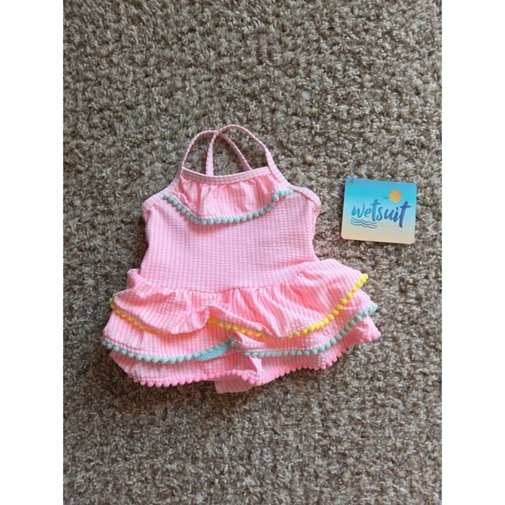Girls NWT pink striped ruffle swimsuit
